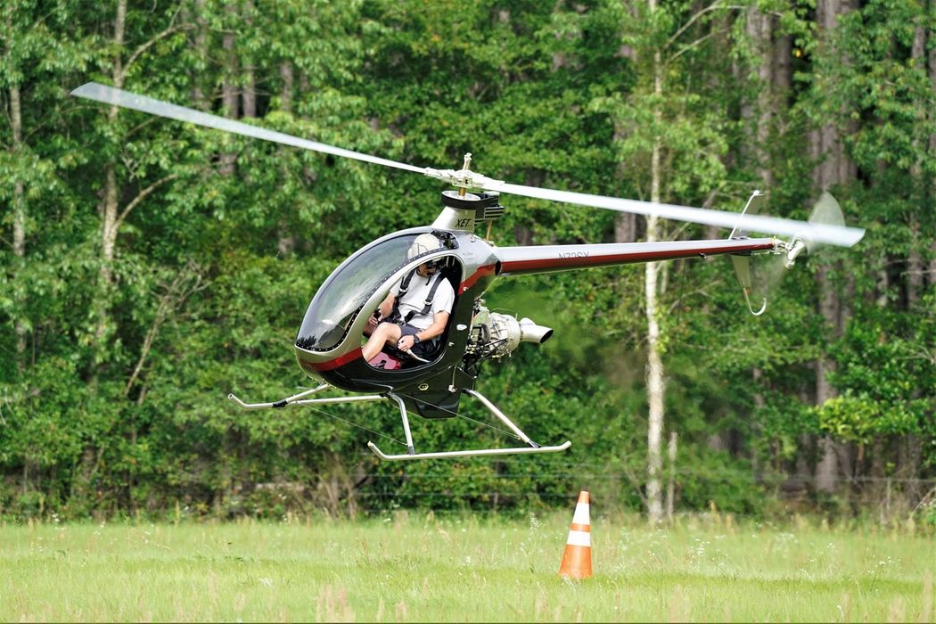 Storey Aviation flying Mosquito XET helicopter at Composite FX