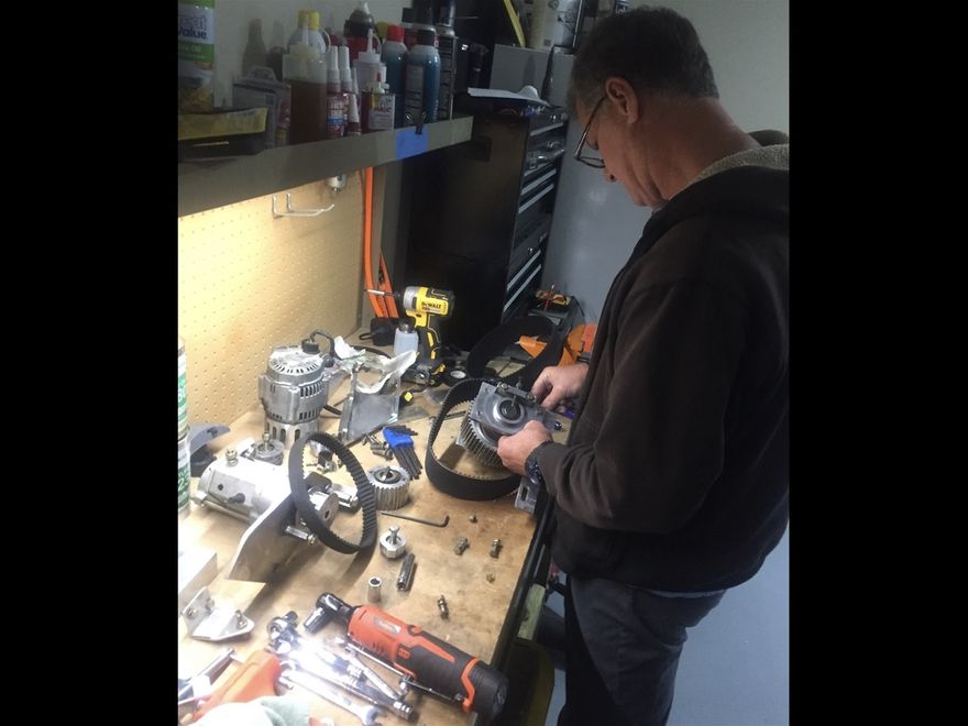 Dave Storey overhauling CFX Mosquito XET parts